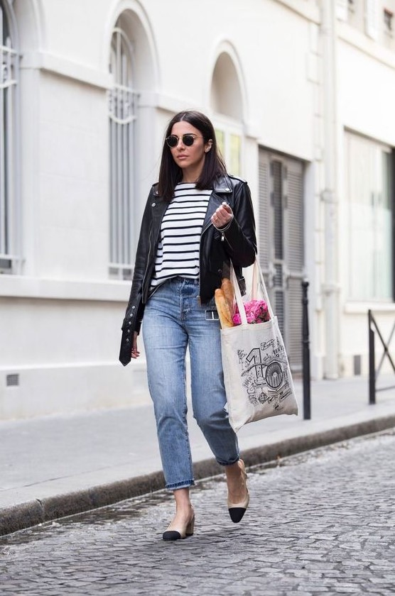 straight leg blue jeans, a striped top, a black leather jacket, two tone shoes and a tote for spring