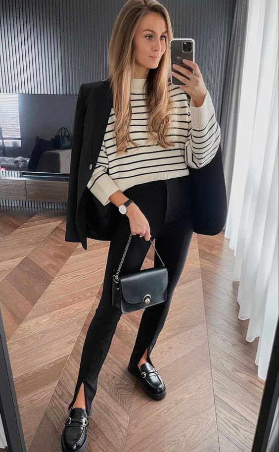 a Breton stripe jumper, black pants, loafers, a blazer and a bag are a cool monochromatic look for spring