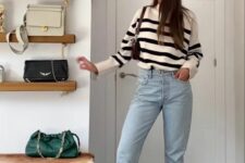 35 a Breton stripe jumper, bleached blue jeans, white sneakers, a brown bag and a black cap are a lovely everyday look