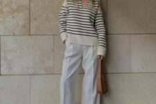38 a Breton stripe polo shirt, white palazzo pants, white sneakers and a brown bag are amazing for spring
