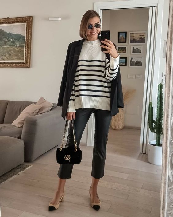 a spring outfit with a Breton stripe jumper, a black blazer, black leather cropped pants, two tone shoes and a black bag