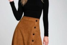 An outfit with a black fitted turtleneck and a brown suede button front knee-length skirt