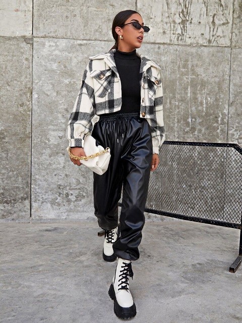 With black and white plaid crop jacket, sunglasses, silver rounded earrings, white leather chain strap bag and black and white leather lace up mid calf platform boots