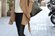 With black leather tote bag, brown waterfall jacket and black and gray high heeled ankle boots