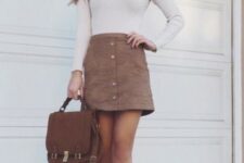 With brown leather ankle boots and brown bag