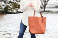 With brown leather tote bag and brown leather low heeled ankle boots