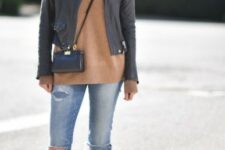 With mirrored rounded sunglasses, black leather crop jacket, black leather crossbody mini bag and beige suede flat shoes