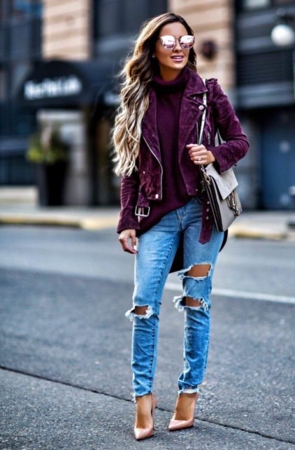 With mirrored sunglasses, purple suede jacket, gray bag and pale pink patent leather high heels