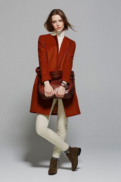 With red collarless belted coat, marsala leather bag, gray socks and brown suede ankle boots