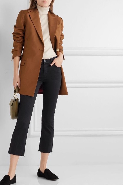 With silver rounded earrings, olive green leather mini bag, black velvet flat shoes and brown long blazer