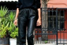With sunglasses, black leather bag and black leather cutout ankle boots