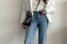 With white puffer jacket, black leather crossbody bag and black leather heeled boots