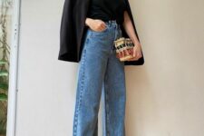 a black t-shirt, a black blazer, blue wide leg jeans, a woven bag with tassels are a lovely look for spring