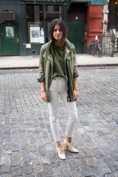 a gree t shirt, a green utility jacket, white cropped jeans and neutral shoes are a lovely look