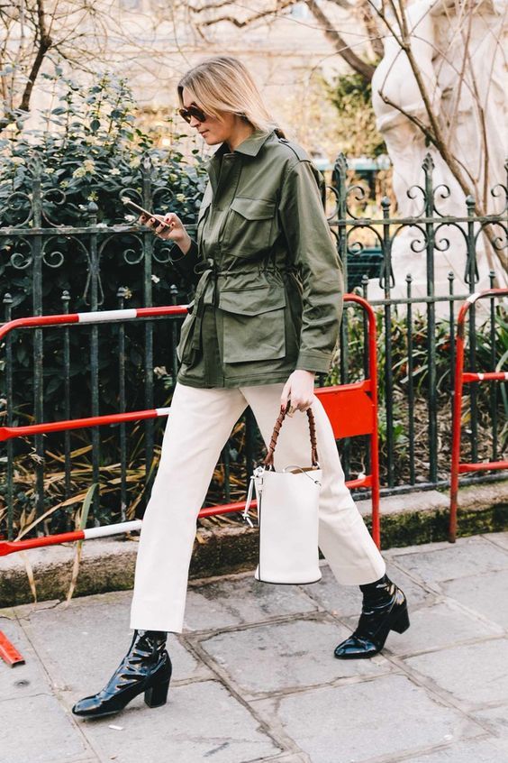 a green utility jacket, white straight leg jeans, black lacquer boots and a white bucket bag are grea for spring