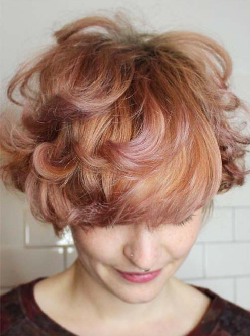 A messy short bob cut with a rose, peach and golden combination is a beautiful and textured idea to rock