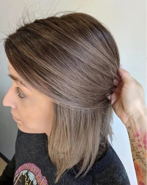 a short mushroom brown bob with volume and texture is a pretty and lovely idea for anyone, it's not too bold and looks nice