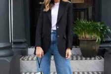 a white t-shirt, blue wide leg jeans, a black blazer and black strappy shoes are a lovely combo for every day