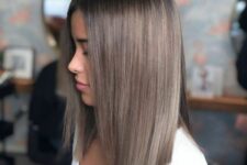 beautiful sleek mushroom brown hair plus a long bob with central parting is a very chic and stylish idea with a modern feel