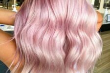 gorgeous peachy rose gold wavy hair is a lovely idea to try this summer, it looks very girlish