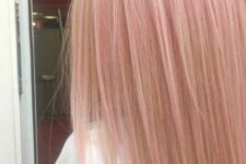 long and straight peachy rose gold hair is a lovely idea to try this year if natural hair colors aren’t interesting for you