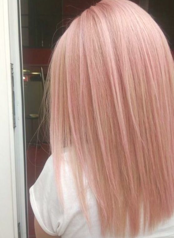 long and straight peachy rose gold hair is a lovely idea to try this year if natural hair colors aren't interesting for you