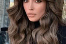 long and wavy mushroom brown hair with a darker root is a gorgeous idea for any girl, show off the beautiful of your locks