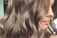 lovely mushroom brown medium length wavy hair with a warmer root is a pretty solution with a delicate transition of colors