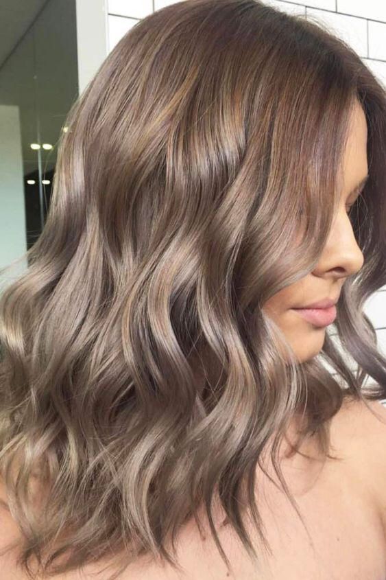 lovely mushroom brown medium length wavy hair with a warmer root is a pretty solution with a delicate transition of colors