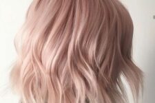 shoulder-length peachy rose blonde hair with waves is a stylish idea for anyone with light-colored or blonde hair