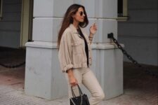 03 a black tee, beige flare pants, a tan cropped denim jacket, black sneakers and a small black bag