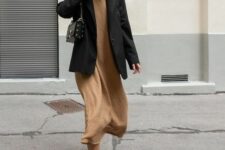 04 a beige midi dress, an oversized black blazer, black slippers and a studded bag for an elegant spring work look