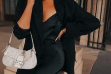 05 a black slip dress, a black blazer, white trainers and a white bag are a comfy and girlish outfit