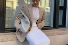 06 a white pleated midi dress, a tan oversized blazer, a white woven bag, creamy square toe boots for a chic and girlish look