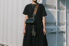 07 a black t-shirt, black pleated midi skirt, black high top sneakers, a catchy black bag and layered necklaces