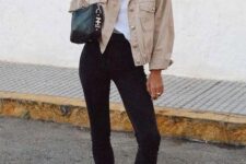 08 a white t-shirt, black skinnies, black combat boots, a black bag and a cropped oversized tan denim jacket