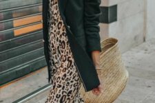 09 a leopard print slip maxi dress, an oversized black blazer, white slippers, a statement necklace and a straw bag