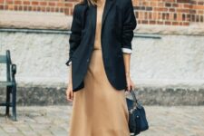 11 a nude slip midi dress, an oversized black blazer, a bag and flats are a simple and elegant combo for work
