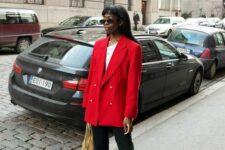 12 a white one shoulder top, an oversized red blazer, black pants, black heels and a woven bag for spring