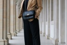 13 a bold and contrasting look with a black turtleneck, culottes, chunky boots, a bag and a beige blazer is amazing