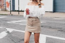 14 a sexy summer outfit with a white off the shoulder top, a tan denim mini, white sneakers