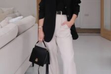 15 a dramatic look with a black t-shirt and an oversized blazer, neutral trousers, white sneakers and a black bag is great for spring