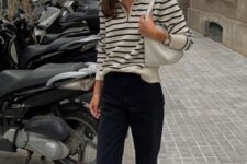 16 a Breton stripe polo shirt, black pants, black high tops, a white bag and a chain necklace are a perfect monochromatic look