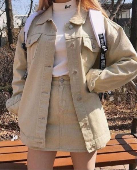 a cozy outfit with a white turtleneck, a tan denim mini and a matching oversized jacket plus a white backpack