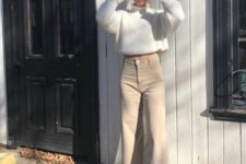 19 a creamy ribbed sweater, tan flare jeans, white sneakers for a lovely winter to spring look