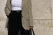 21 a stylish spring to summer work outfit with a white bodysuit, a greige oversized blazer, black pants, a black bag and a black belt
