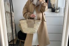 22 a neutral midi dress, a beige trench, white sneakers, a straw bag are a great combo for spring