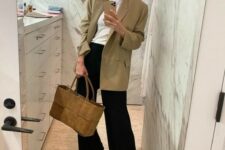 22 a stylish work outfit with a white t-shirt, a beige oversized blazer, black pants, nude shoes and a stylish suede bag