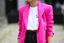 24 a bold and sexy outfit with a white crop top, black shorts, a hot pink oversized blazer and statement accessories