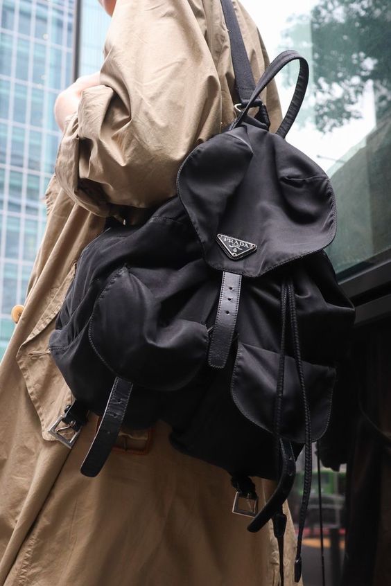 a black backpack is a great addition to many looks and it will allow you to carry a lot of things